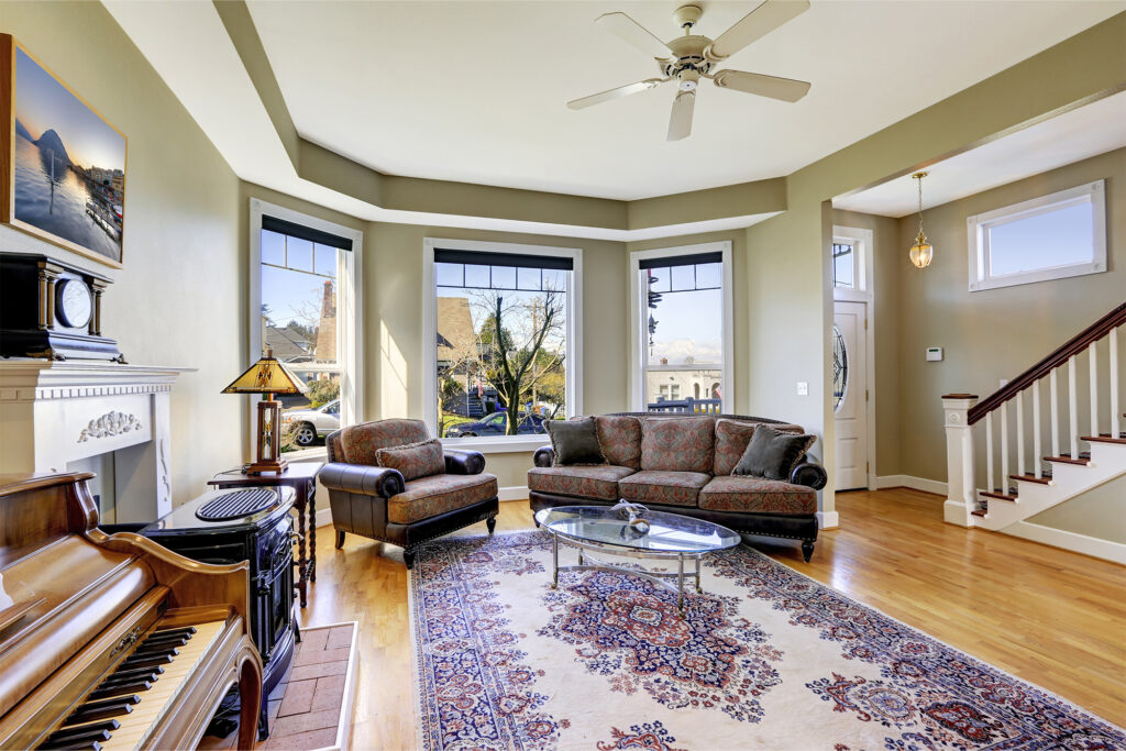 Area rug complementing flooring and furniture in a refreshed living room