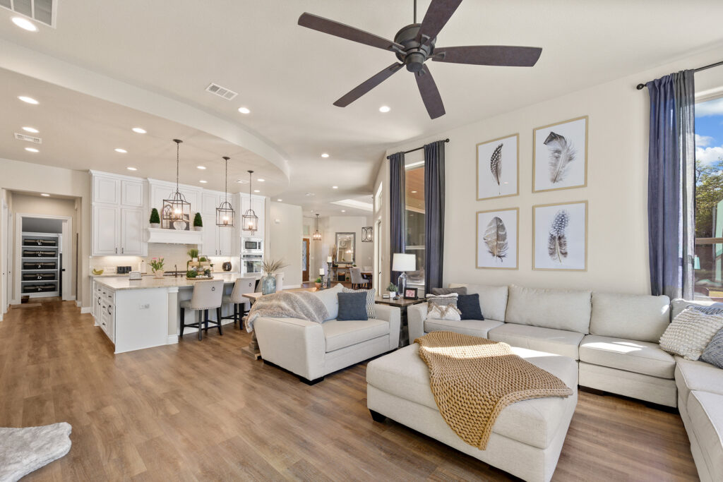 Laminate flooring installed throughout a bright Tipp City living room